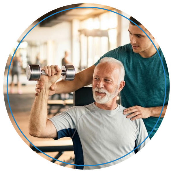 personal trainer guiding a man while lifting weights
