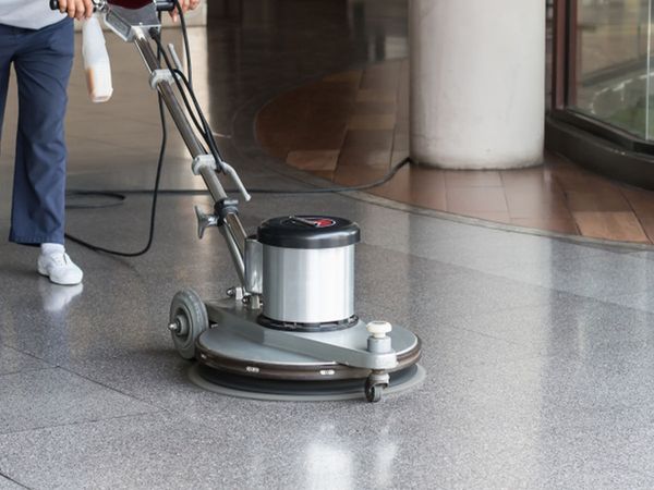 Image of a floor cleaner polishing a surface.