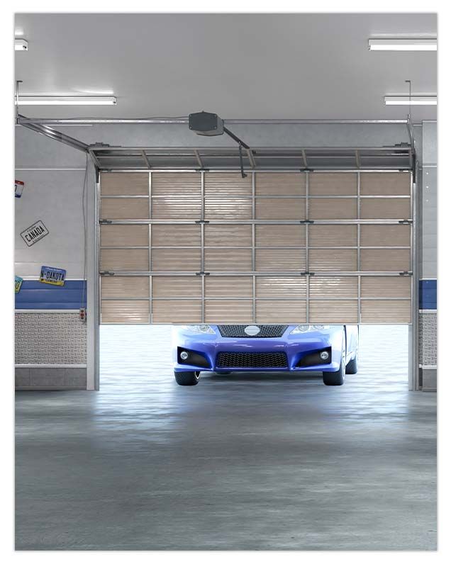blue car pulling into garage