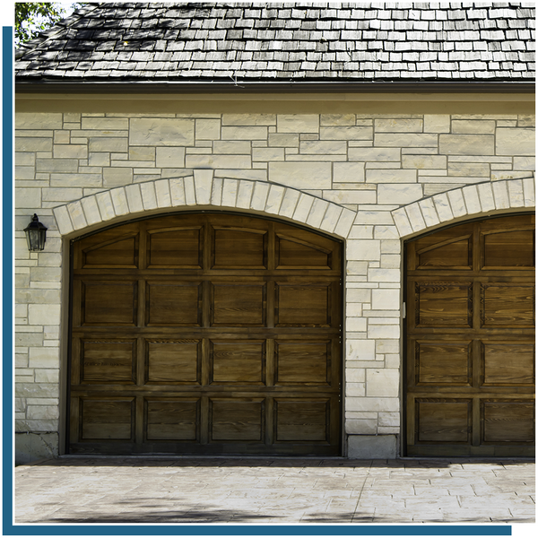 tuscan style brown wood garage doors