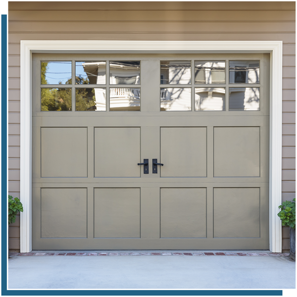 garage door panel with decorative black handles