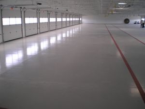 Nascar-Epoxy-Application-100_-Solids-epoxy-coatings-CRU--scaled.jpg