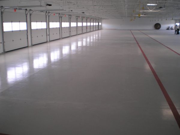 Nascar-Epoxy-Application-100_-Solids-epoxy-coatings-CRU--scaled.jpg