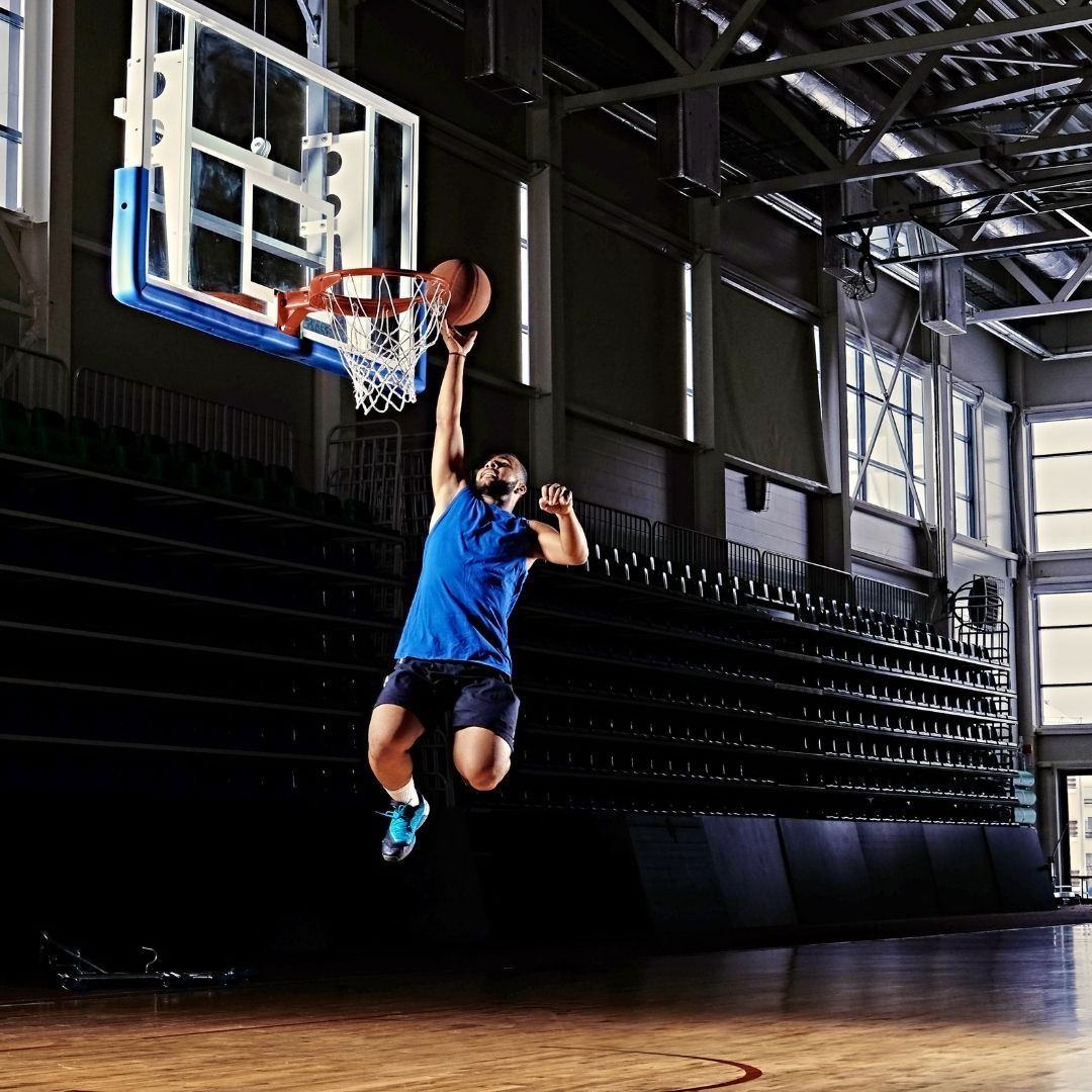 a player making a slam dunk