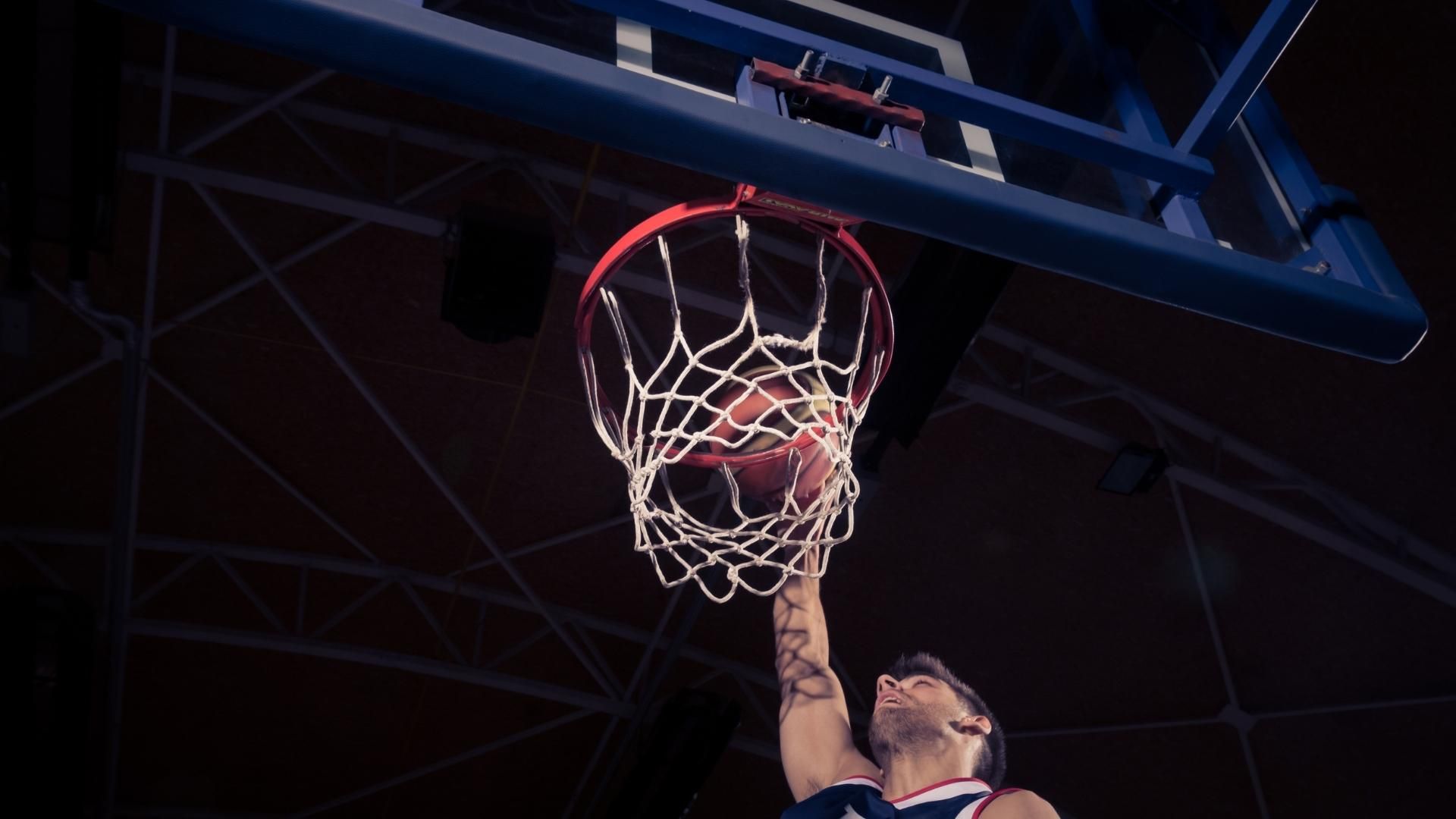 Basketball player dunking