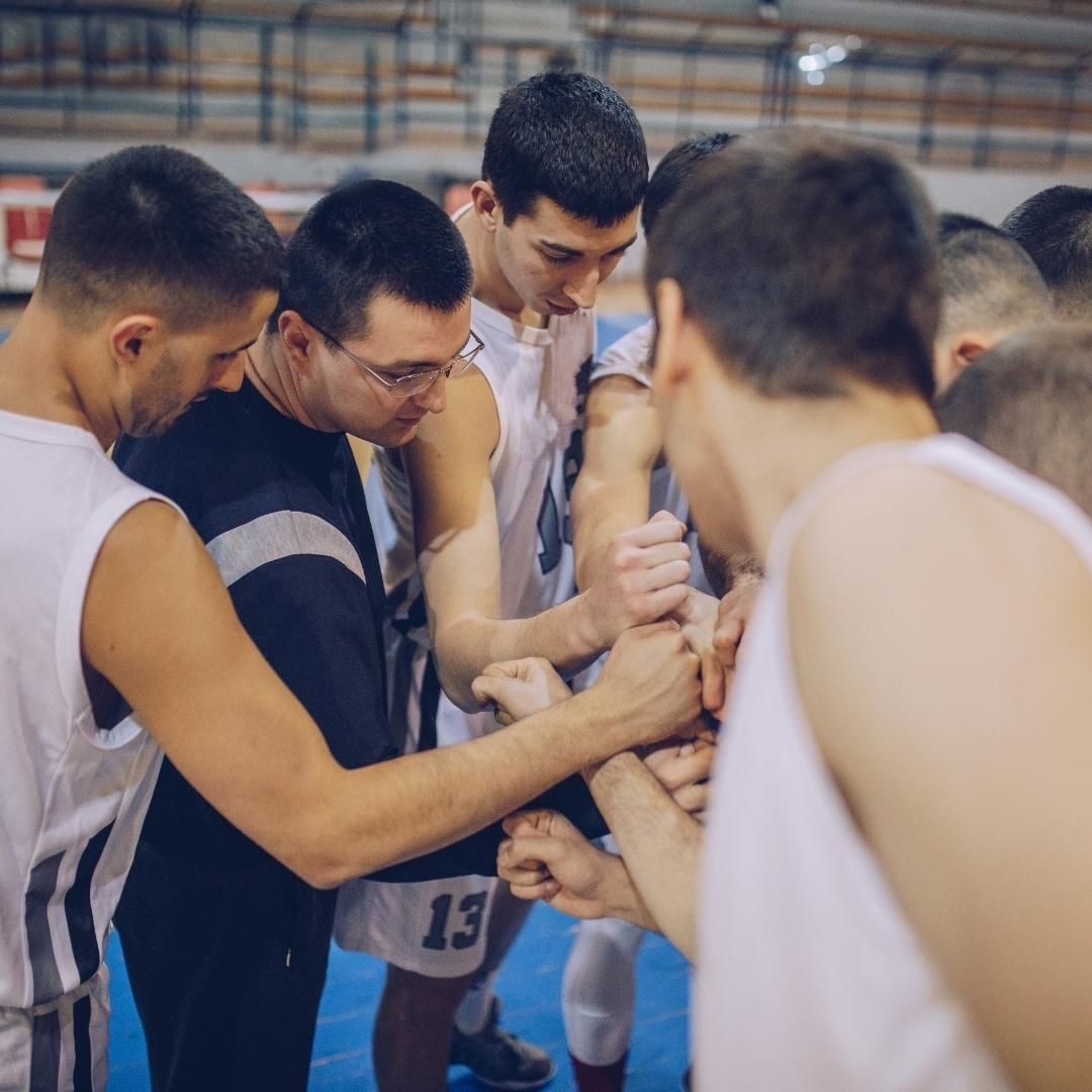 Basketball team huddle