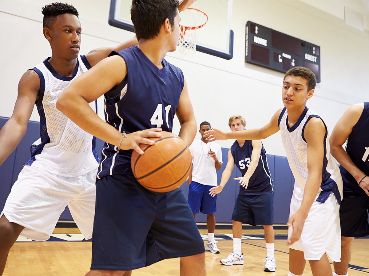 high school teams playing a game of basketball