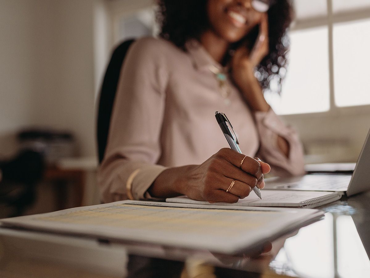 photo of girl taking organized notes