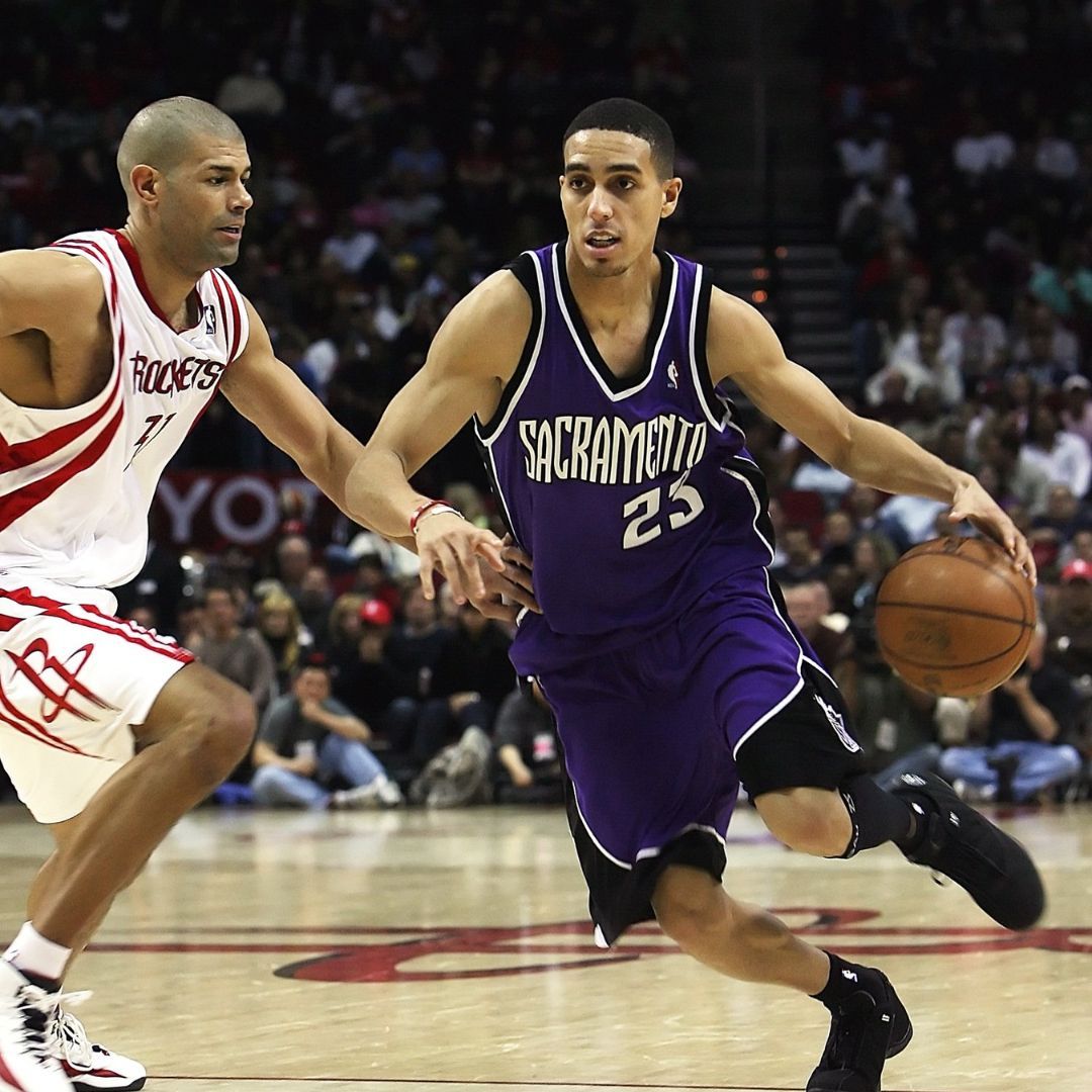 a man dribbling around an opponent