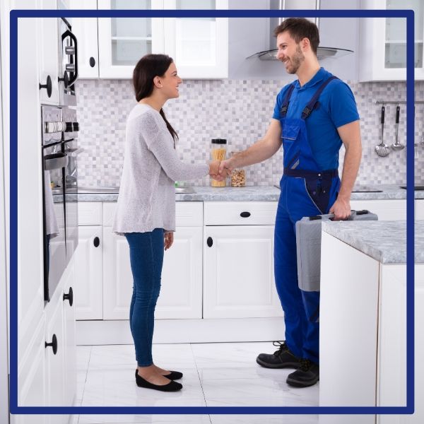 A happy 4S Ranch customer shakes hands with a reliable Plumbing Plus plumber in her kitchen after a successful service call. A happy 4S Ranch customer shakes hands with a reliable Plumbing Plus plumber in her kitchen after a successful service call.