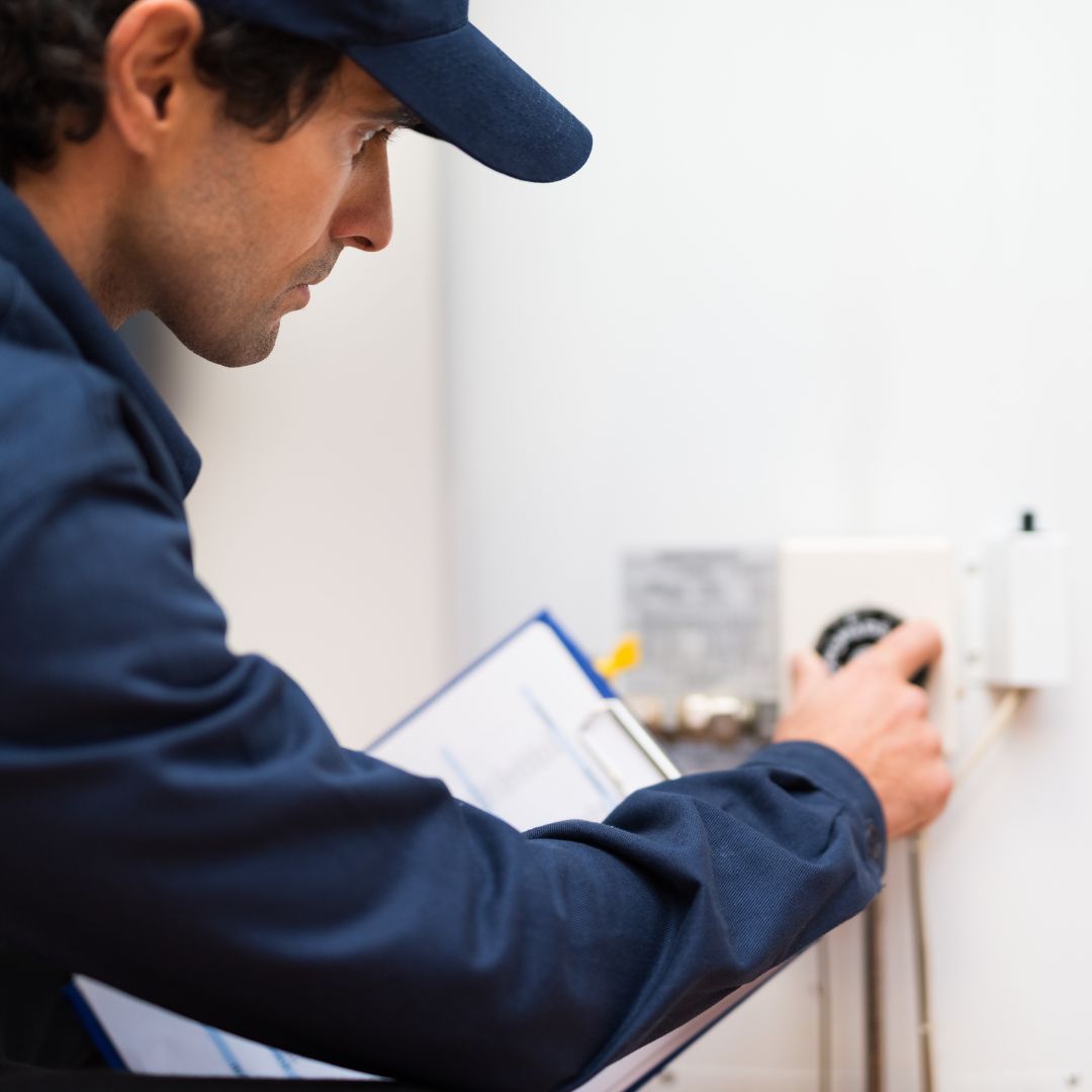 plumber checking water heater