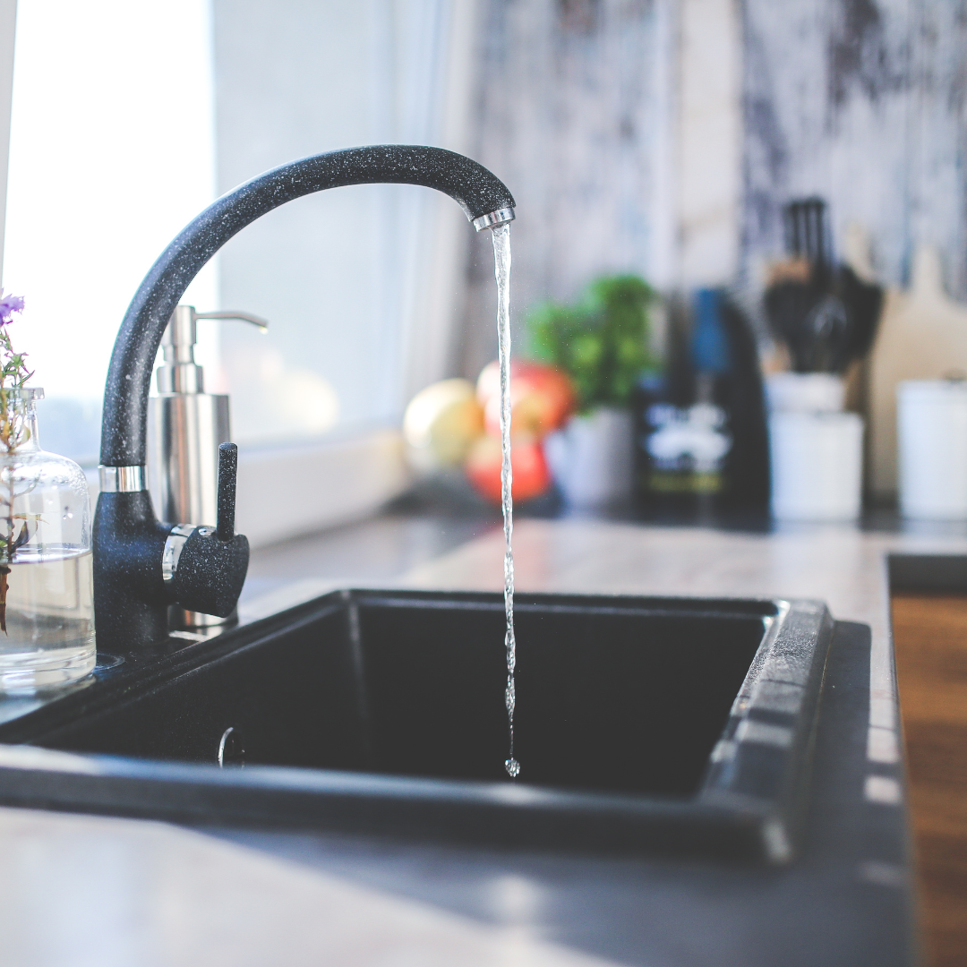 A faucet running water