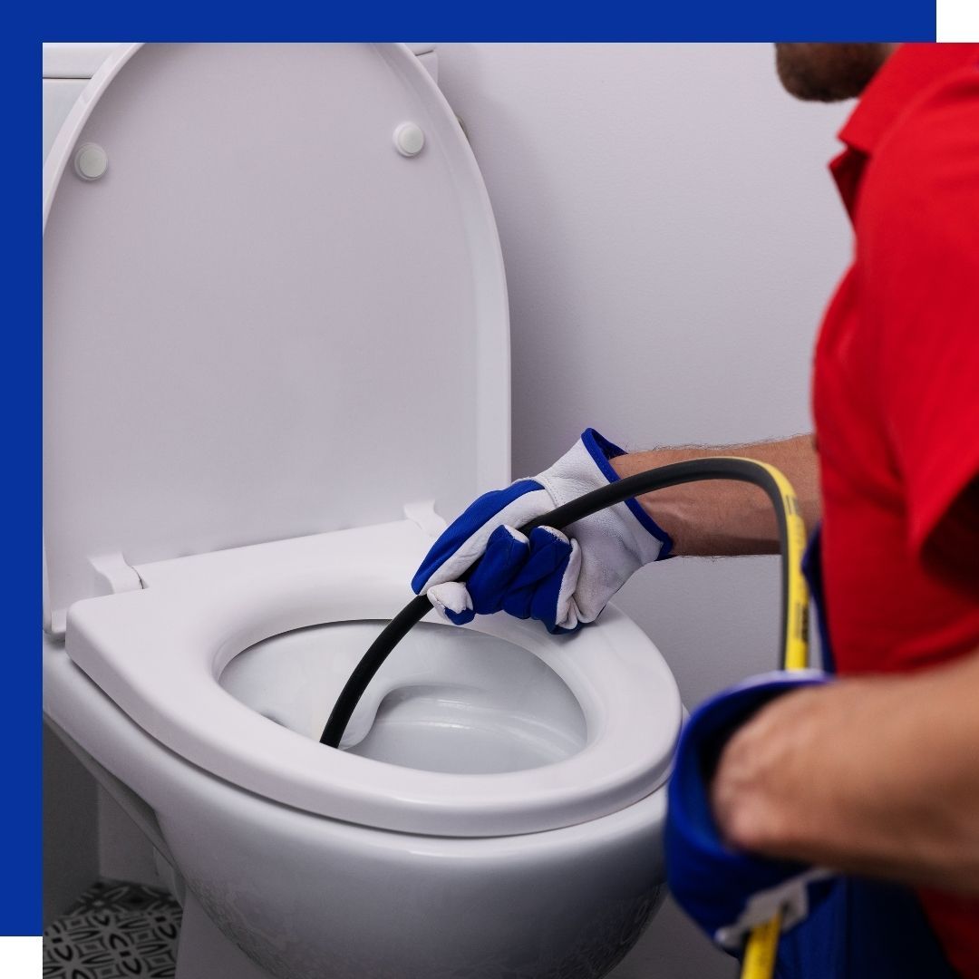 plumber hydrojetting toilet