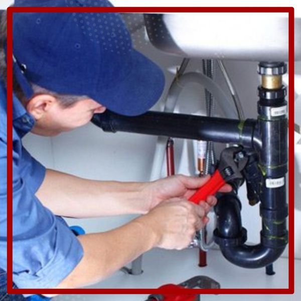 Person repairing water pipe