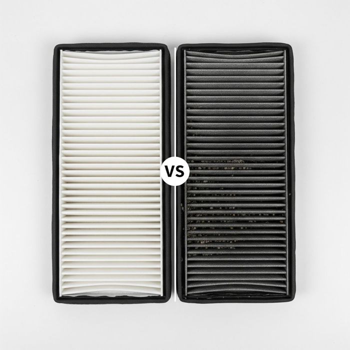 A side-by-side comparison of a new, white car air filter and a dirty, clogged one. A side-by-side comparison of a new, white car air filter and a dirty, clogged one.