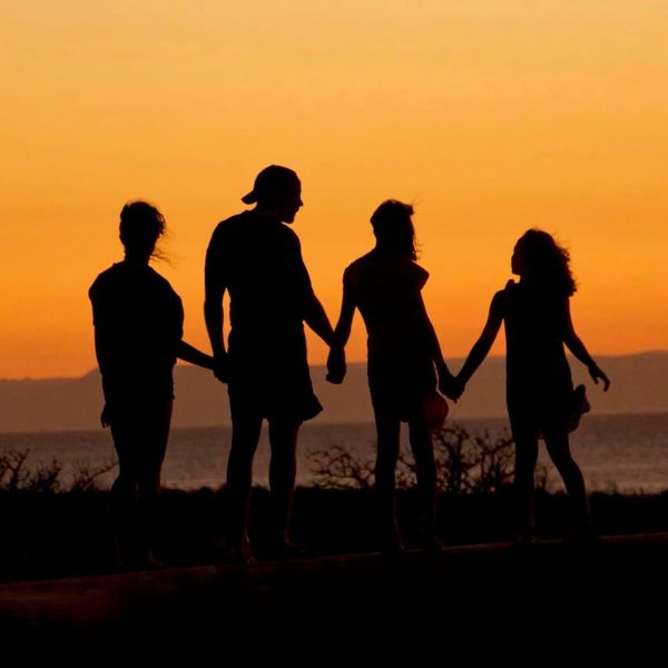 sunset silhouette family on a walk sunset silhouette family on a walk