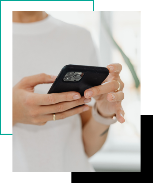 A close-up image of a woman checking her smartphone.