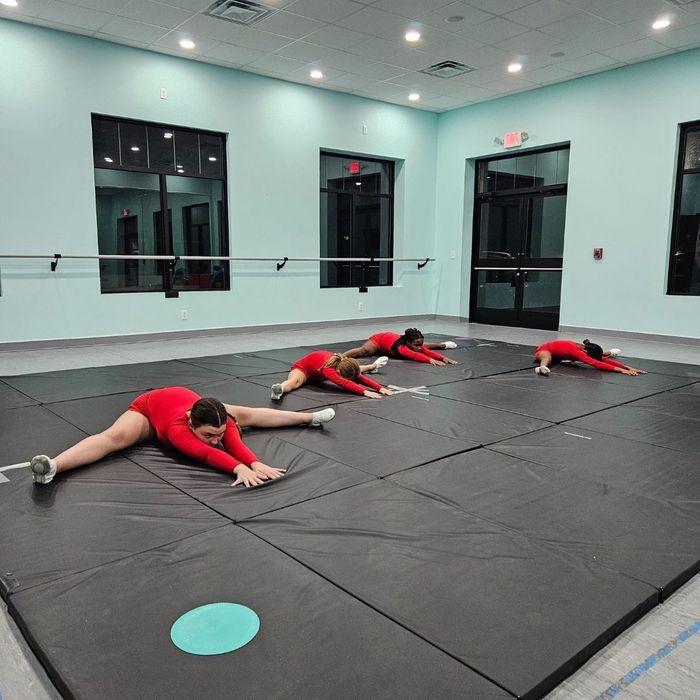 class working on stretching 