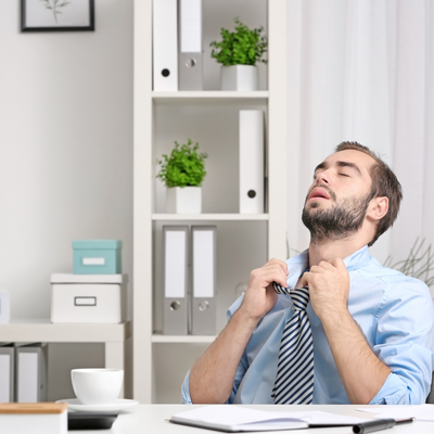 man in office with inconsistent Air Conditioning
