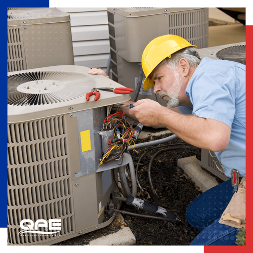 an HVAC looking at an AC condenser