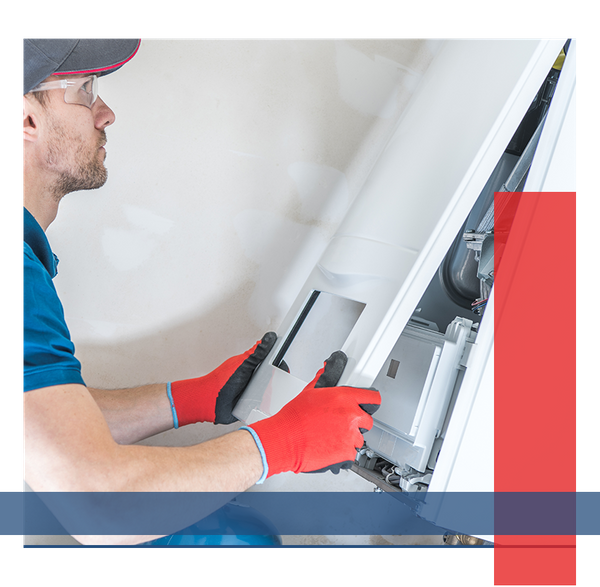 HVAC technician performing repairs on a broken unit.