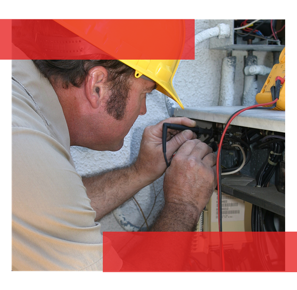 Image of an HVAC technician performing repairs.