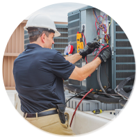 Circle crop of man working on AC unit wiring