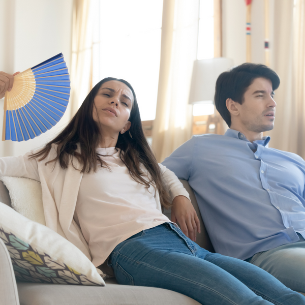 people on couch suffering from the hea 2 - people on couch suffering from the heat.png