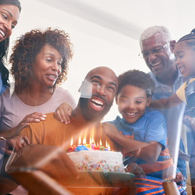 Happy family celebrating a birthday.