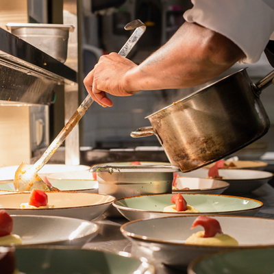 Chef preparing several desserts at once.