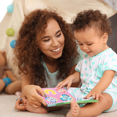 Mother reading to her child.