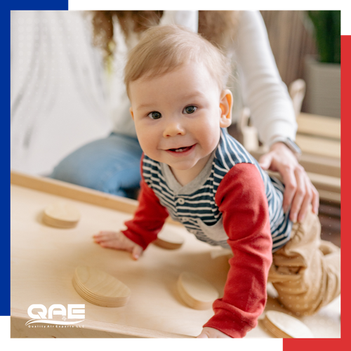 baby playing in home