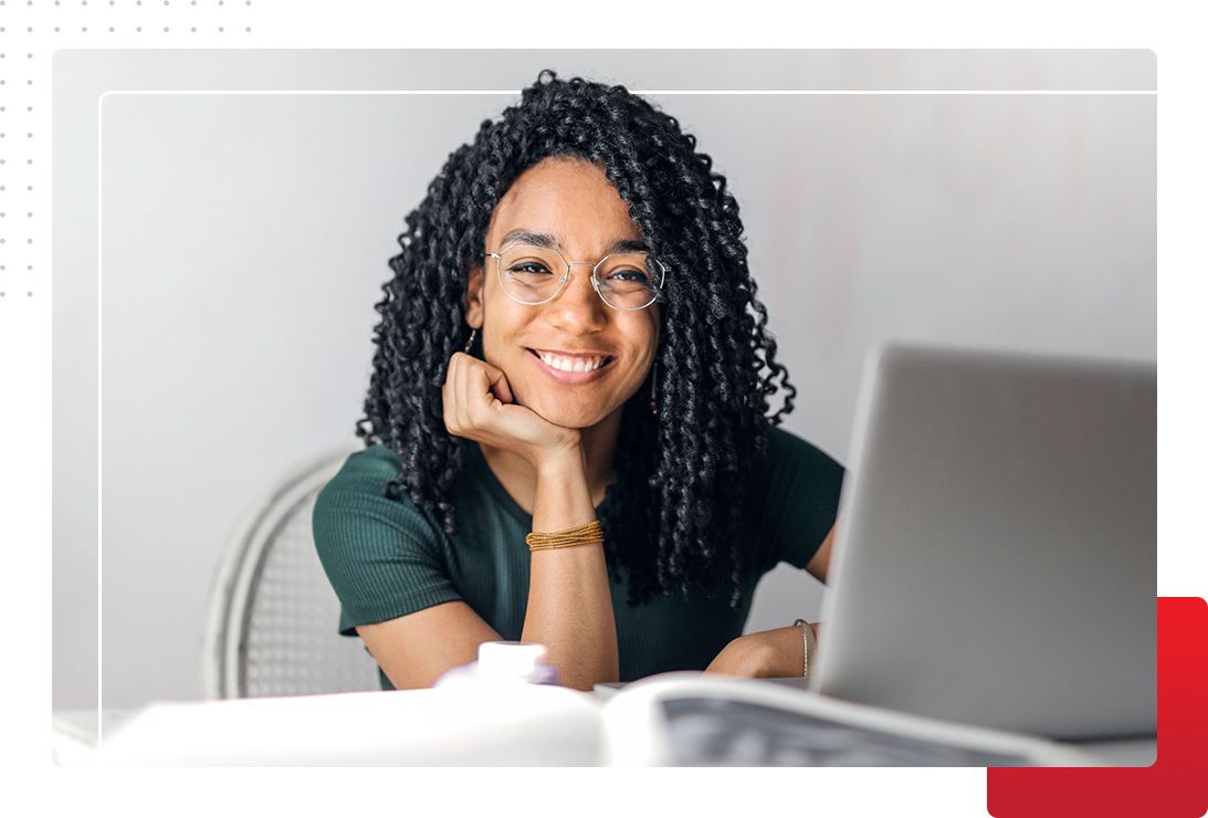 woman with laptop smiling