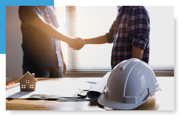 contractor shaking hands with client