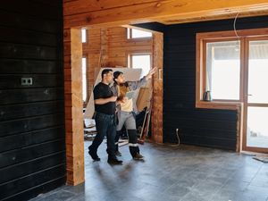 contractors walking through space for remodel