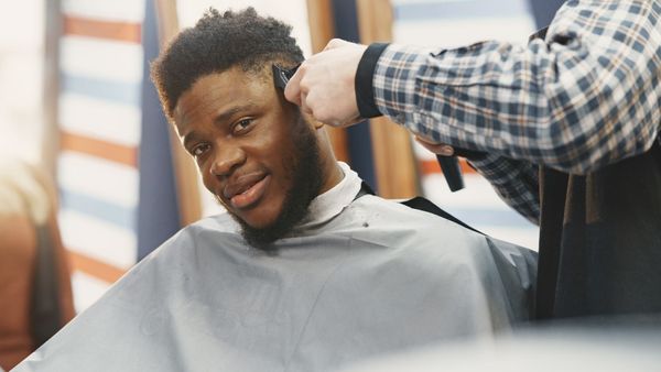 confident man getting haircut