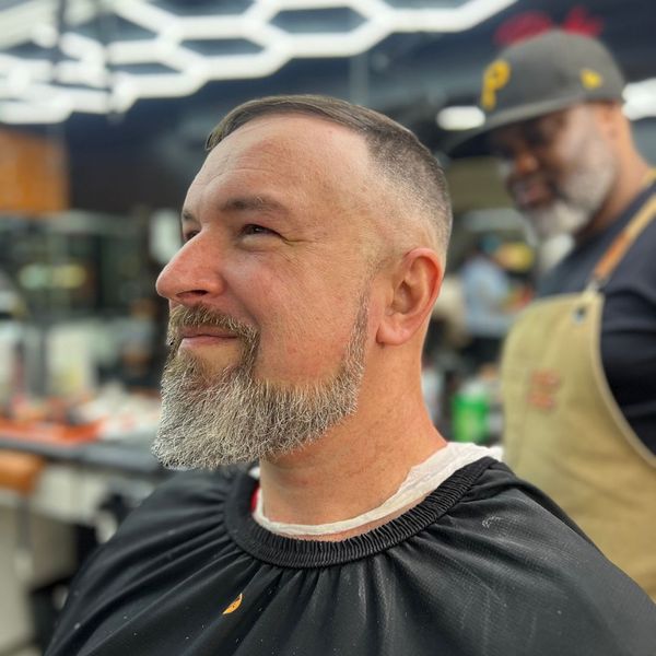 Happy man with a fresh haircut