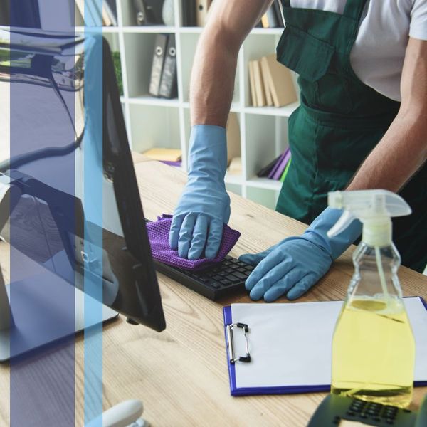 wiping down computer keyboard