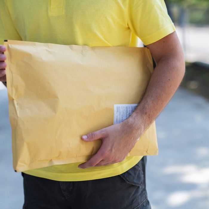 delivery person carrying a package