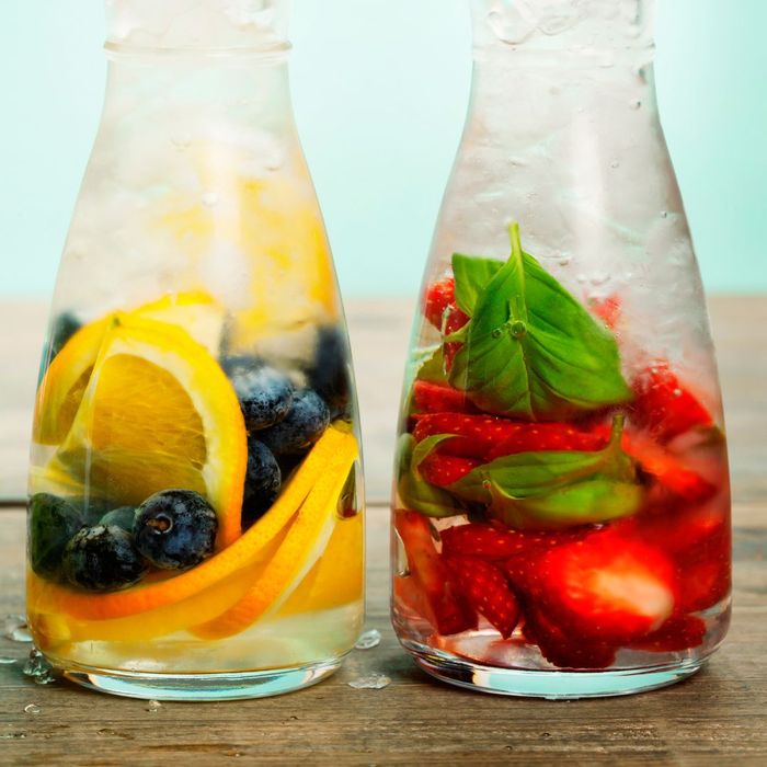 water jugs with fruits inside