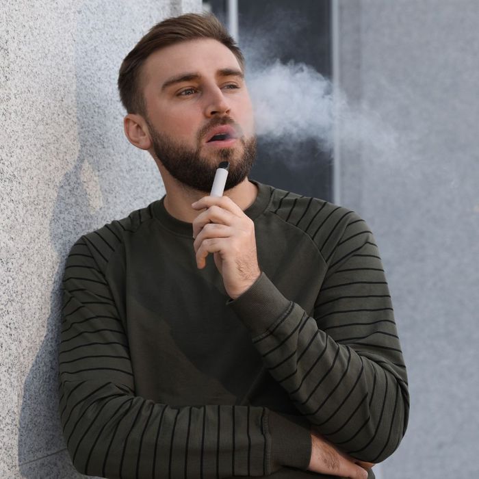 man with disposable vape