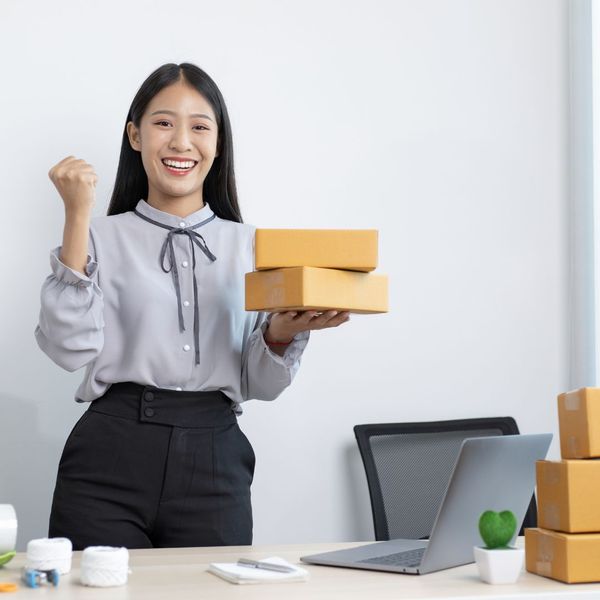 woman holding boxes
