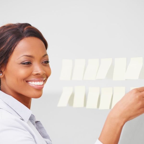 woman organizing with sticky notes