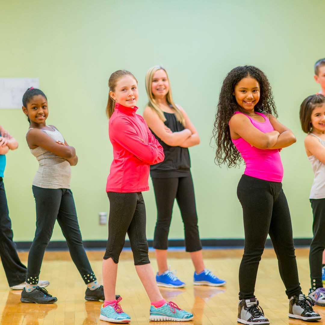 girls posing in dance studio