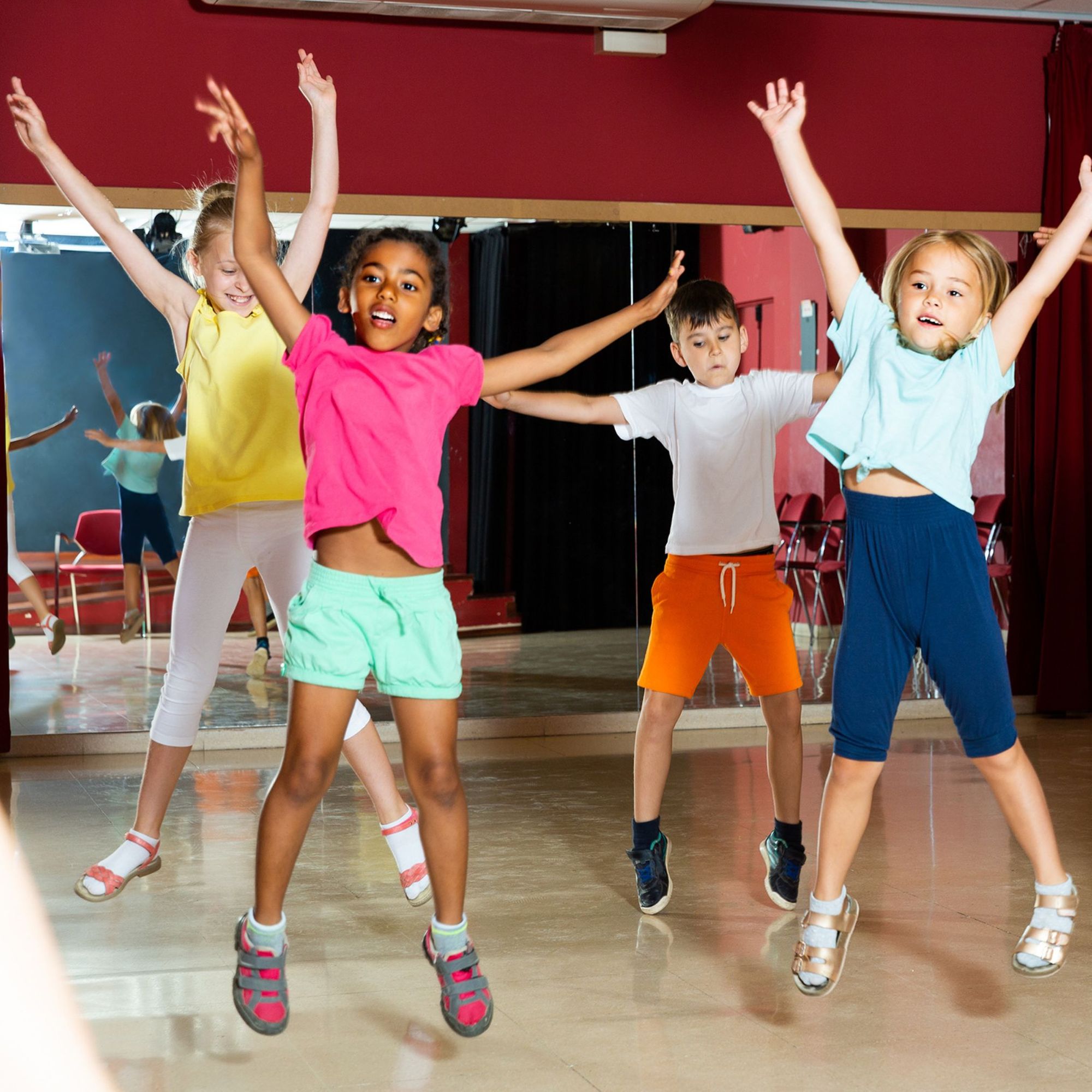 children jumping in dance class