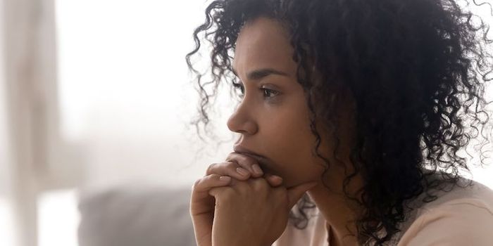 Closeup of a person with a stressed expression