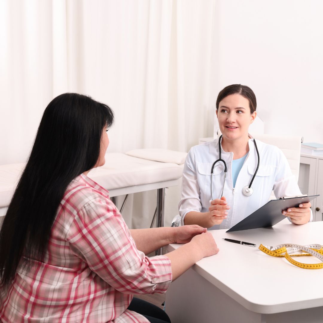 a weight loss consultant talking with a patient