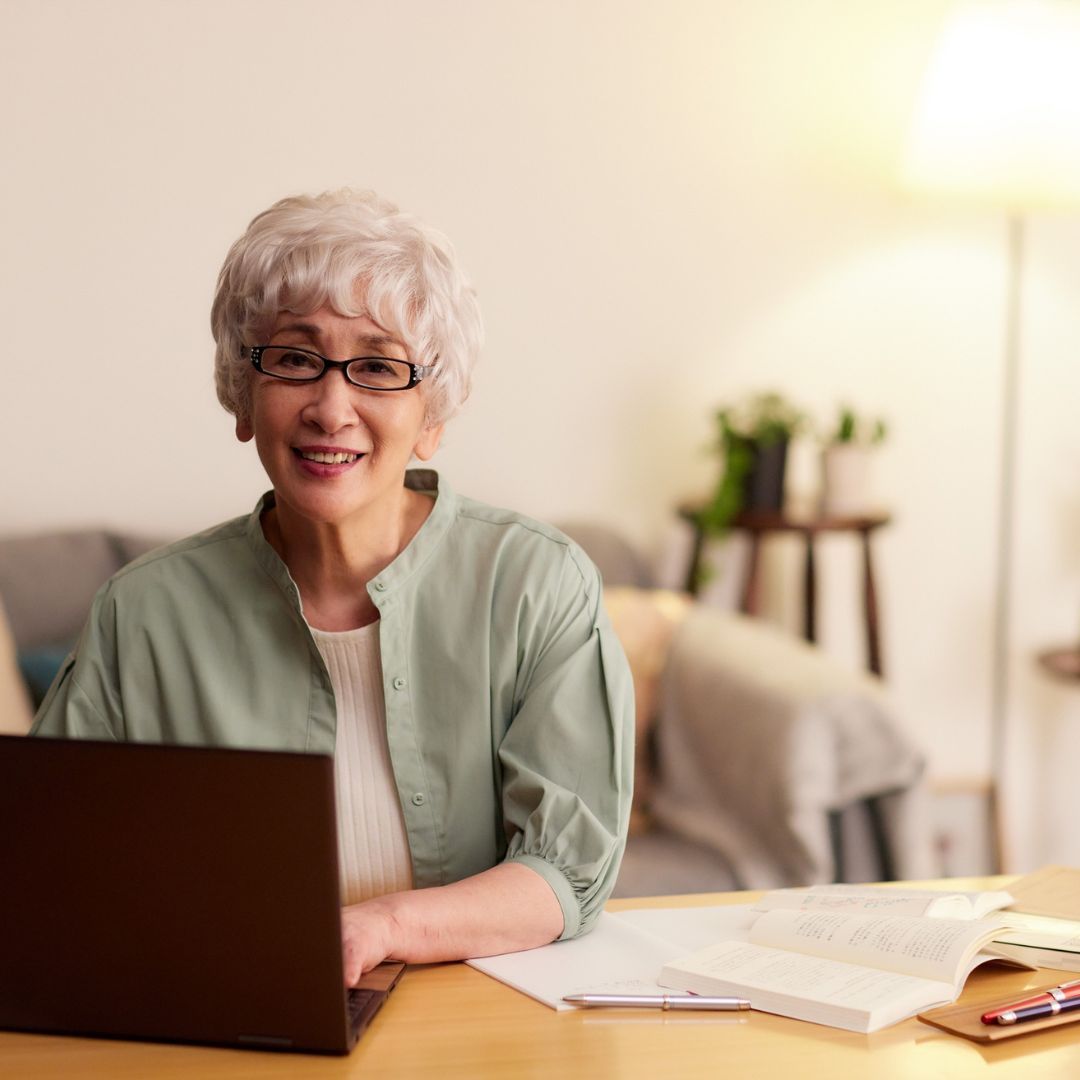 older woman on computer older woman on computer