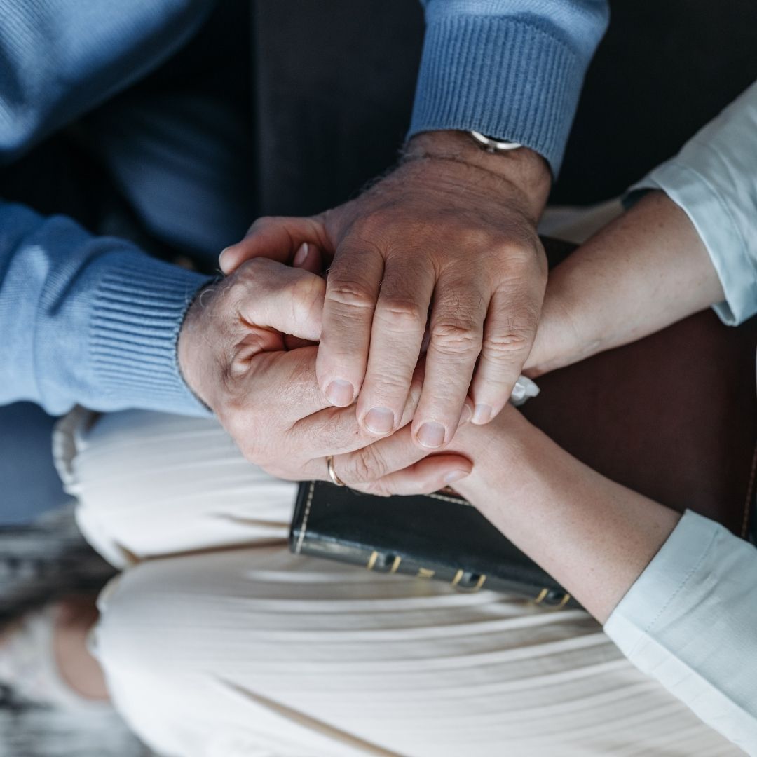 couple holding hands