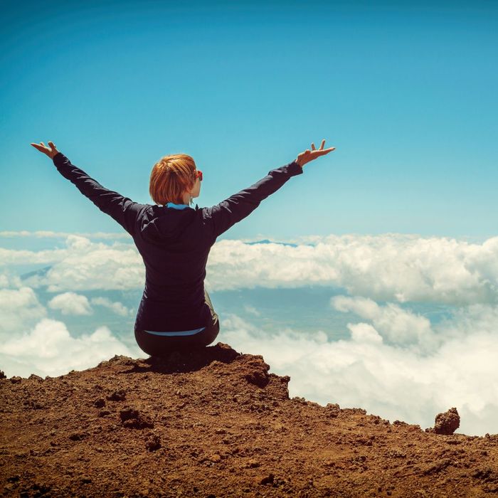 Women sitting on mountain 